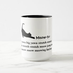 O estiramento: Caneca do gato do meow-ku