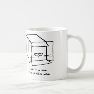 O gato irritado esconde em uma caixa - caneca de