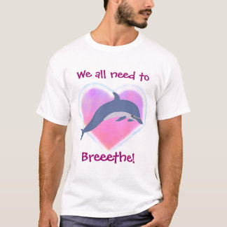 O golfinho respira o t-shirt