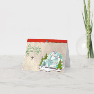 O iglu tempera o cartão de Natal dos cumprimentos