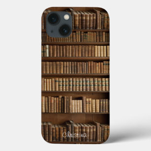 O iPad de madeira velho da estante e dos livros