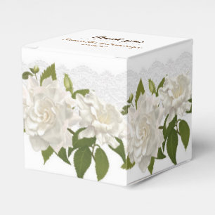 O laço do casamento floresce a caixa de presente
