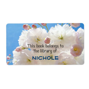 O livro pertence à biblioteca de suas etiquetas