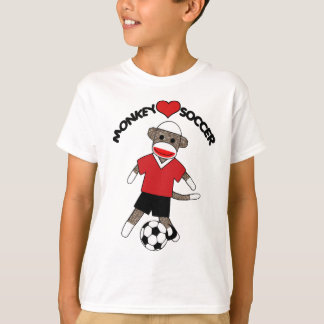 O macaco da peúga do futebol caçoa o t-shirt