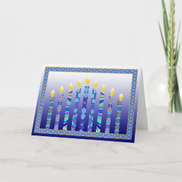 O menorah de Hanukkah candles o cartão