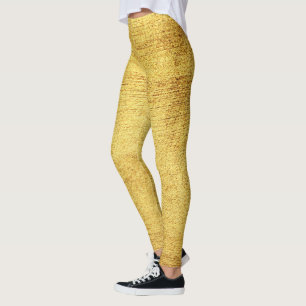 O mundo ouro das leggings modernas e brilhantes