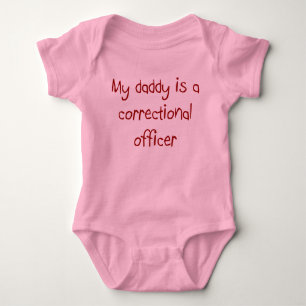 O pai é um t-shirt correccional do bebê do ofici