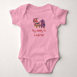 O pai é um t-shirt do bebê do carniceiro