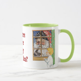 O papai noel antigo que sacode sua caneca do dedo