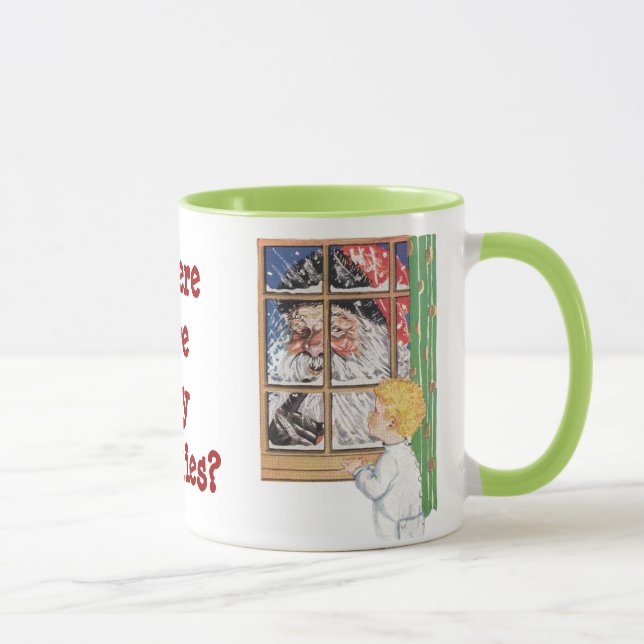 O papai noel antigo que sacode sua caneca do dedo (Direita)