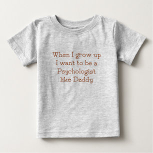 O psicólogo gosta do t-shirt do bebê do pai