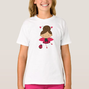 O t-shirt bonito da menina pequena da menina do