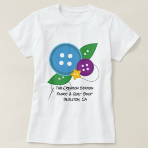 O t-shirt do botão da estação da criação (ver