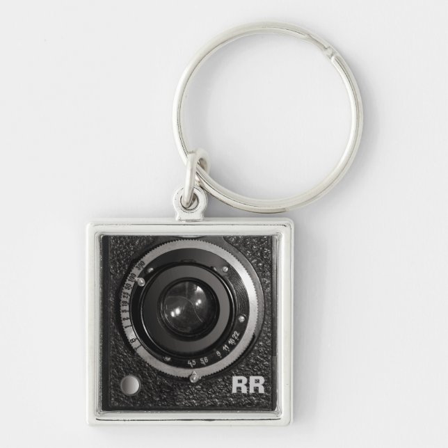 Objectiva do vintage em um chaveiro (Frente)