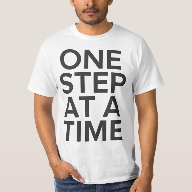 One Step at a Time Motivational T-Shirt (Frente)