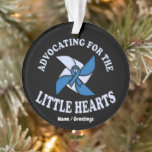 Ornamento Advocating for Little Hearts Child Abuse Preventio<br><div class="desc">Show your support during Child Abuse Prevention Month (April) with this meaningful and professional advocacy design. Featuring the iconic Blue Ribbon Pinwheel, this artwork is specifically created for child advocates, social workers, teachers, and families dedicated to building a safer future. Whether you're participating in Wear Blue Day or a community...</div>