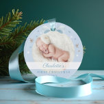 Ornamento Baby First Christmas Blue Bow & Stars<br><div class="desc">Celebrate the joy of your baby's first Christmas with our Elegant Baby's First Christmas Ornament. This charming keepsake features a beautifully painted blue watercolor bow adorning the top, adding a touch of elegance and sweetness to your holiday decor. Designed as a cherished memento, the ornament includes a special place to...</div>