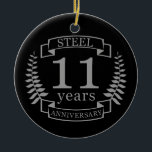 Ornamento De Cerâmica 11 anos de casamento do aço<br><div class="desc">Uma design para celebrar 11 anos de casamento. Este design tem uma cinza (aço) de design de louros colorida sobre um fundo preto. O aço é o presente tradicional para esta ocasião. O texto diz: Aniversário de 11 anos de Steel. Uma design romântica para comemorar seu 11 ano de casamento....</div>