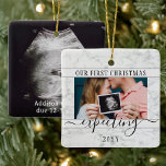 Ornamento De Cerâmica 2 Gravidez Fotográfica Novos Pais 1rua Xmas Espera<br><div class="desc">Comemore o presente de precioso do seu mais novo membro da família com um ornamento cerâmico de mármore faux quadrado de na moda de 2 fotos. A design neutra em termos de gênero é adequada para um novo menino ou menina. Palavras e imagens neste modelo são simples de personalizar. (DICA...</div>