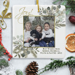 Ornamento De Cerâmica Alegria! Elegante Eucalyptus e Pine Holiday Photo<br><div class="desc">Este Enfeites de natal maravilhoso é uma maneira maravilhosa de enviar cartões de natal. Ele mostra sua foto cercada por pinturas manuais de folhas de eucalipto e galhos de pinheiros em tons de verde-sábio e ouro. A legenda diz: Joy! Há espaço para uma breve saudação ou nota. Elegante e elegante,...</div>