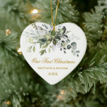 Ornamento De Cerâmica Aquarela Verde Nosso Primeiro Coração de Natal Dou<br><div class="desc">O Casal verde verde moderno Elegante inclui um belo verde botânico de cor aquosa,  folhas de eucalipto e outras lindas folhagens. Dourado Script.</div>