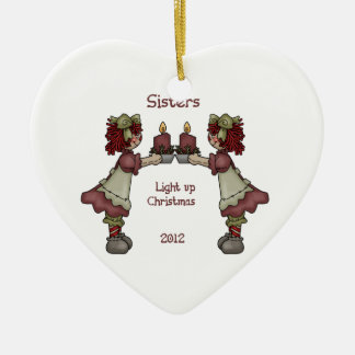 Ornamento De Cerâmica As irmãs iluminam acima o Natal