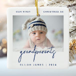 Ornamento De Cerâmica Avós 1rua Foto de Natal Blue Minimalista<br><div class="desc">Ajude-os a celebrar a chegada do seu primeiro neto com este ornamento moderno minimalista de manutenção de fotos. O texto azul marinho lê "Nosso primeiro Natal como avós", com a palavra "avós" em letra de imprensa. Substitua facilmente a imagem de exemplo pela sua foto favorita do novo bebê e adicione...</div>