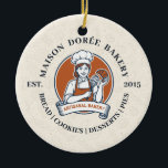 Ornamento De Cerâmica Bakery Store Pastry Chef Dessert Sweets Cake Baker<br><div class="desc">This vintage-style circular logo features a cheerful female pastry chef wearing a traditional white chef's hat and apron. She is framed by a warm orange circular backdrop and holds a wire whisk in one hand and a flaky croissant in the other, symbolizing her culinary expertise. Below her, a blank, elegant...</div>