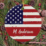Ornamento De Cerâmica Bandeira Americana EUA Personalizado Patriótico<br><div class="desc">Este ornamento da bandeira americana é a maneira perfeita de mostrar seu espírito patriótico nesta temporada de festas. O ornamento apresenta o design icônico Estrelas e Stripes em cores vermelho, branco e azul. É um presente de excelente para veteranos militares e suas famílias, ou qualquer um que ama a América...</div>