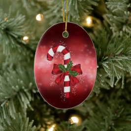 Ornamento De Cerâmica Bengala de Natal Vermelha em um Fundo Bokeh Vermel