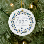 Ornamento De Cerâmica Blue Wreath First Christmas Engajado<br><div class="desc">Blue Wreath First Christmas Engaged Cerâmica Ornament. Itens correspondentes disponíveis.</div>