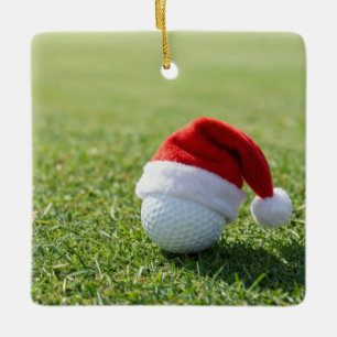 Ornamento De Cerâmica Bola de golfe de Natal com chapéu de Papai Noel em