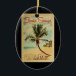 Ornamento De Cerâmica Bonita Primavera Palm Tree Viagens vintage<br><div class="desc">Uma impressão de arte moderna do século médio,  a Bonita Primavera da Flórida,  no estilo viagens vintage. Ele apresenta uma palmeira curva na praia arenosa com oceano sob um céu azul nublado.</div>
