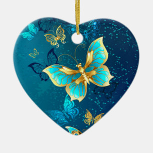 Ornamento De Cerâmica Borboletas Douradas em um Fundo Azul