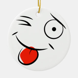 Ornamento De Cerâmica cara saindo da língua. Face de framboesa
