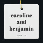 Ornamento De Cerâmica Cartão Único de Local Personalizado Casamento de N<br><div class="desc">Torne seu casamento no inverno especial com este ornamento cerâmico personalizado único, dobrando como um cartão de lugar personalizado para seus convidados. Apresentando o seu nome em tipografia elegante, serve como um cartão de escolta ponderado e um guardião que eles podem tesourar. Perfeito para um casamento de Natal, esta design...</div>