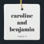 Ornamento De Cerâmica Cartão Único de Local Personalizado Casamento de N<br><div class="desc">Torne seu casamento no inverno especial com este ornamento cerâmico personalizado único, dobrando como um cartão de lugar personalizado para seus convidados. Apresentando o seu nome em tipografia elegante, serve como um cartão de escolta ponderado e um guardião que eles podem tesourar. Perfeito para um casamento de Natal, esta design...</div>