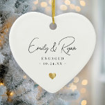 Ornamento De Cerâmica Casal Anúncio do Noivado Dourado Guarda-Cardíaca<br><div class="desc">Celebre o seu amor com um toque de elegância! Este ornamento de manutenção apresenta um coração de ouro personalizado — perfeito para marcar um noivado ou casamento. Uma maneira eterno de lembrar seu grande dia!</div>