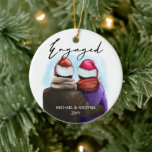 Ornamento De Cerâmica Casal e Nomes de Aquarela de Script Envolvido<br><div class="desc">Envolvido, ornamento personalizado da árvore de natal. Esta design de aquarela tem uma ilustração de tendência de um casal vestindo chapéus de Santa. "Envolvido" é escrito à mão na escrita moderna e o modelo está pronto para você adicionar seus nomes e o ano. Duplo lado com o mesmo design em...</div>