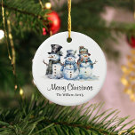 Ornamento De Cerâmica Clássico Feliz Natal Aquarela Snowman<br><div class="desc">Elevem a vossa celebração de Natal com o nosso ornamento festivo cerâmico, adornada com uma família alegre de bonecos de neve e a mensagem animadora de "Feliz Natal". Este ornamento foi projetado para adicionar um toque de encanto festivo ao seu decoro de férias, fazer-o o companheiro perfeito para suas celebrações...</div>