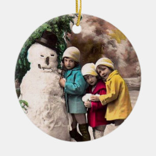 ORNAMENTO DE CERÂMICA CRIANÇAS COM BONECO DE NEVE