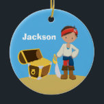 Ornamento De Cerâmica Crianças Piratas Personalizadas Blue Boys Natal<br><div class="desc">Um garoto pirata bonito vestindo um carregando de bandana vermelha uma espada perto de um tesouro cheio de ouro numa praia com fundo azul-celeste. Personalize o Enfeites de natal único deste menino com o nome do seu filho em branco. Ahoy,  matey!</div>