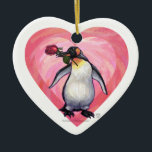 Ornamento De Cerâmica Dia de os namorados de pinguim<br><div class="desc">Parada Animal Romântico Presentes e Acessórios para o Dia do Namorados Pinguim e Corações apresenta nossa trabalho de arte divertida de um pinguim bonitinho segurando um rosa bonito na boca com corações roxos, vermelhos e cor-de-rosa em camadas atrás dela criado pelo nosso talentoso artista Traci Van Wagoner. Nosso divertido pinguim...</div>