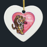 Ornamento De Cerâmica Dia de os namorados Tiger<br><div class="desc">Parada Animal O Tigre Romântico Personalizado Dons e Acessórios para o Dia do Amor e do Coração apresenta nosso trabalho de arte divertido de um tigre giro segurando um rosa bonito na boca com corações roxos, vermelhos e cor-de-rosa em camadas atrás dela criado pelo nosso talentoso artista, Traci Van Wagoner....</div>