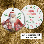 Ornamento De Cerâmica Do Natal do Pai Natal<br><div class="desc">Qualquer criança que ame Papai Noel amará esse Enfeites de natal personalizado dele! A frente tem uma imagem aquosa do velho elfo alegre. Ele está sorrindo e carregando, é claro, presentes de Férias. O texto verde diz "HO HO HO!". A parte de trás do ornamento tem campos de texto que...</div>