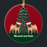 Ornamento De Cerâmica Dois Cachorros de Natal em Santa Hat Personalizado<br><div class="desc">Este belo Enfeites de natal monograma mostra um belo cachorro vestindo um chapéu de Papai Noel em frente a uma bonito árvore de Natal decorada com ornamentos coloridos. Personalize com um nome de dono de animal de estimação em encantador cursivo sob o maravilhoso desenho.</div>