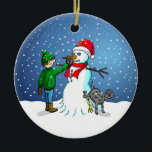 Ornamento De Cerâmica Edifício Snowman<br><div class="desc">O menino construiu um boneco de neve que seu cachorro se sustenta e urina enquanto o menino dá ao boneco de neve um nariz de cenoura.</div>