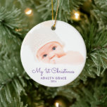 Ornamento De Cerâmica Elegant Script Baby's First Christmas Photo Cerami<br><div class="desc">Este Enfeites de natal redondo oferece o primeiro tema de Natal de um bebê. O texto "Meu Natal de 1rua" aparece num guião roxo elegante. O texto personalizado permite adicionar o nome e o ano do seu recém-nascido.</div>