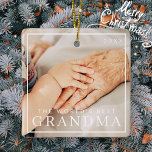 Ornamento De Cerâmica Feriado de Foto da Melhor Avó do Mundo<br><div class="desc">Design é composto por tipografia quic moderna com sans serif e serif font. Adicione duas fotos personalizadas de vovó e ano. Presente perfeito para a melhor avó do mundo,  avó,  mee-maw,  lola,  nana.</div>