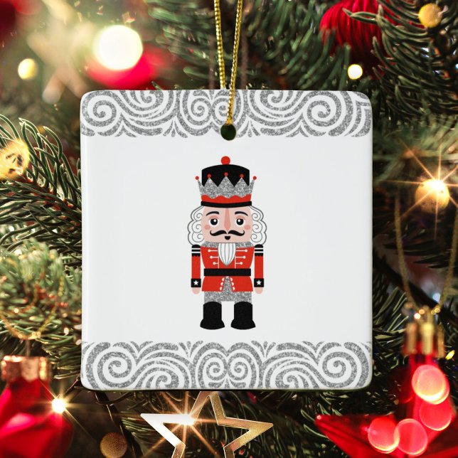 Ornamento De Cerâmica Feriado de Natal do Red Nutcracker (An elegant red and silver nutcracker Christmas Ornament. Put a family photo on the back.)
